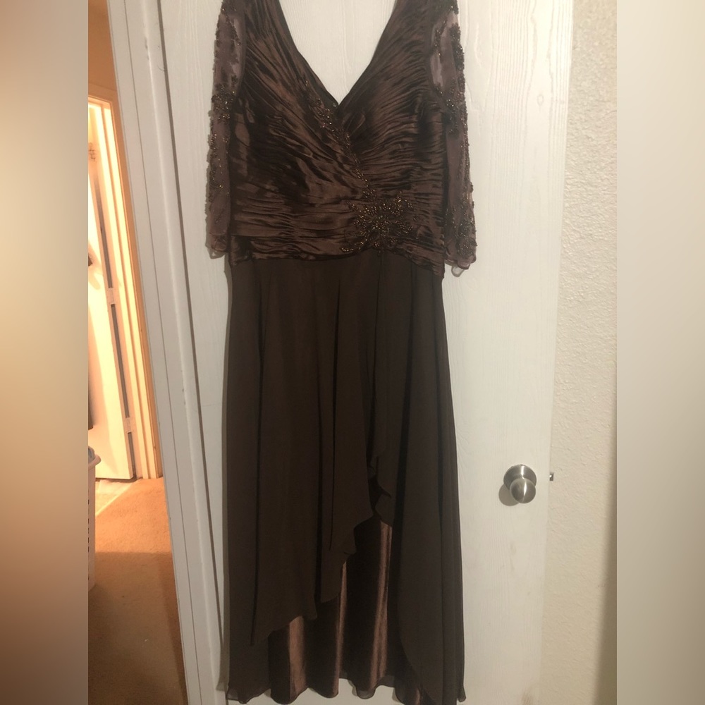 Brown floor length formal gown with 3/4 sleeves, never worn